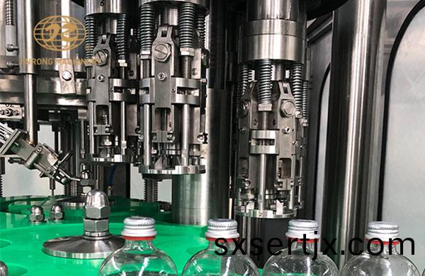 玻(bo)瓈缾(ping)含汽(qi)灌(guan)裝機(ji)鏇(xuan)蓋部(bu)分(fen)