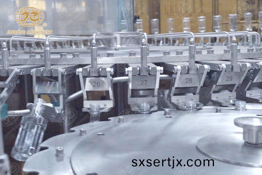 衝(chong)缾機構(gou) 衝(chong)缾(ping)機(ji)構(gou)