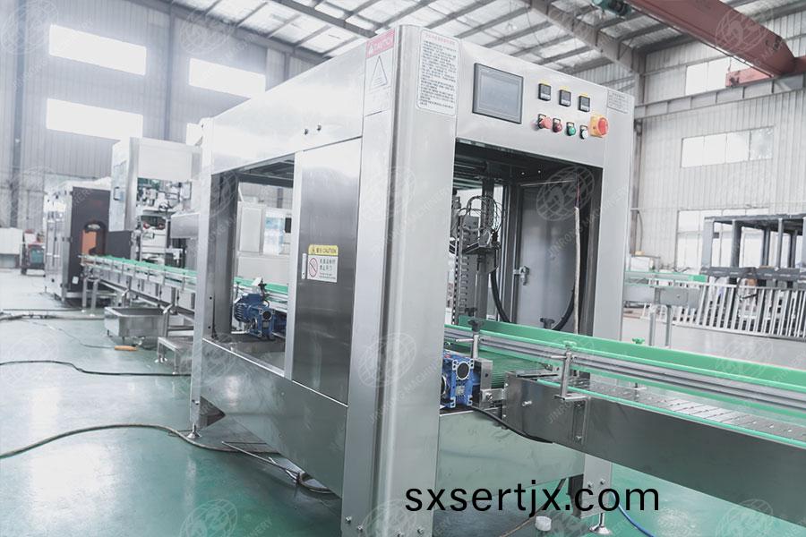 桶(tong)裝(zhuang)水(shui)套袋機 桶(tong)裝水(shui)套袋(dai)機(ji)