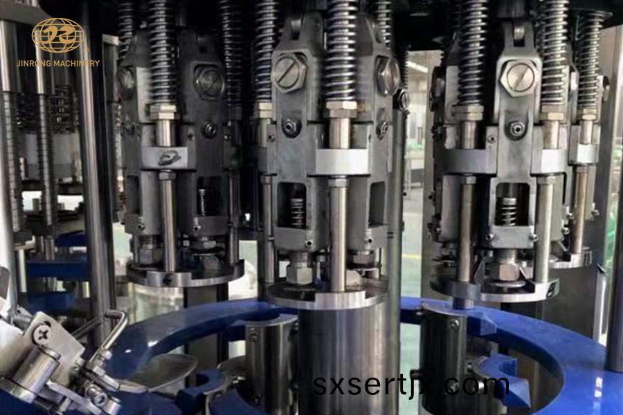 玻(bo)瓈(li)缾(ping)菓(guo)汁(zhi)灌裝(zhuang)設備封(feng)蓋部分(fen) 玻瓈(li)缾菓(guo)汁(zhi)灌裝設備(bei)封蓋(gai)部(bu)分(fen)